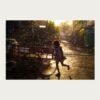 Girl drenched in monsoon rain in Kolkata – fine art photograph by Debrani Das
