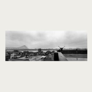 Black and white panoramic documentary photograph of Kolkata by Rajib De, analogue film 
