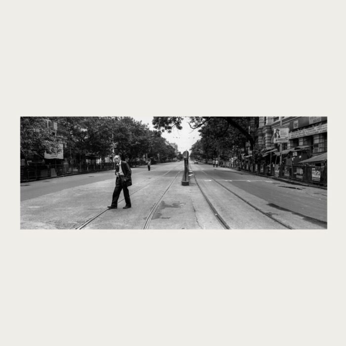 Black and white panoramic documentary photograph of Kolkata by Rajib De, urban life